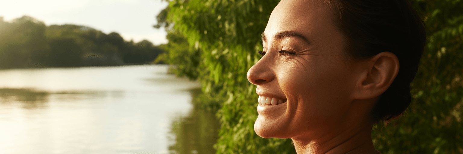 Person smiling confidently outdoors in Brisbane.